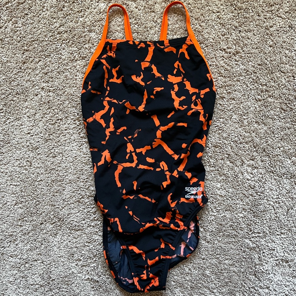 Orange and black Speedo size 30. New with tags